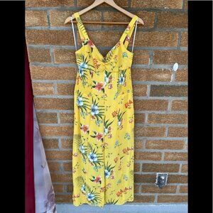 Likely yellow floral jumpsuit size 10